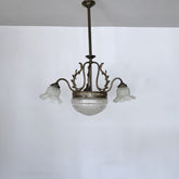 Brass chandelier with a cut glass frosted diffuser shade and three frosted frilled glass shades