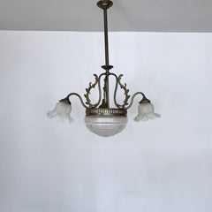 Brass chandelier with a cut glass frosted diffuser shade and three frosted frilled glass shades